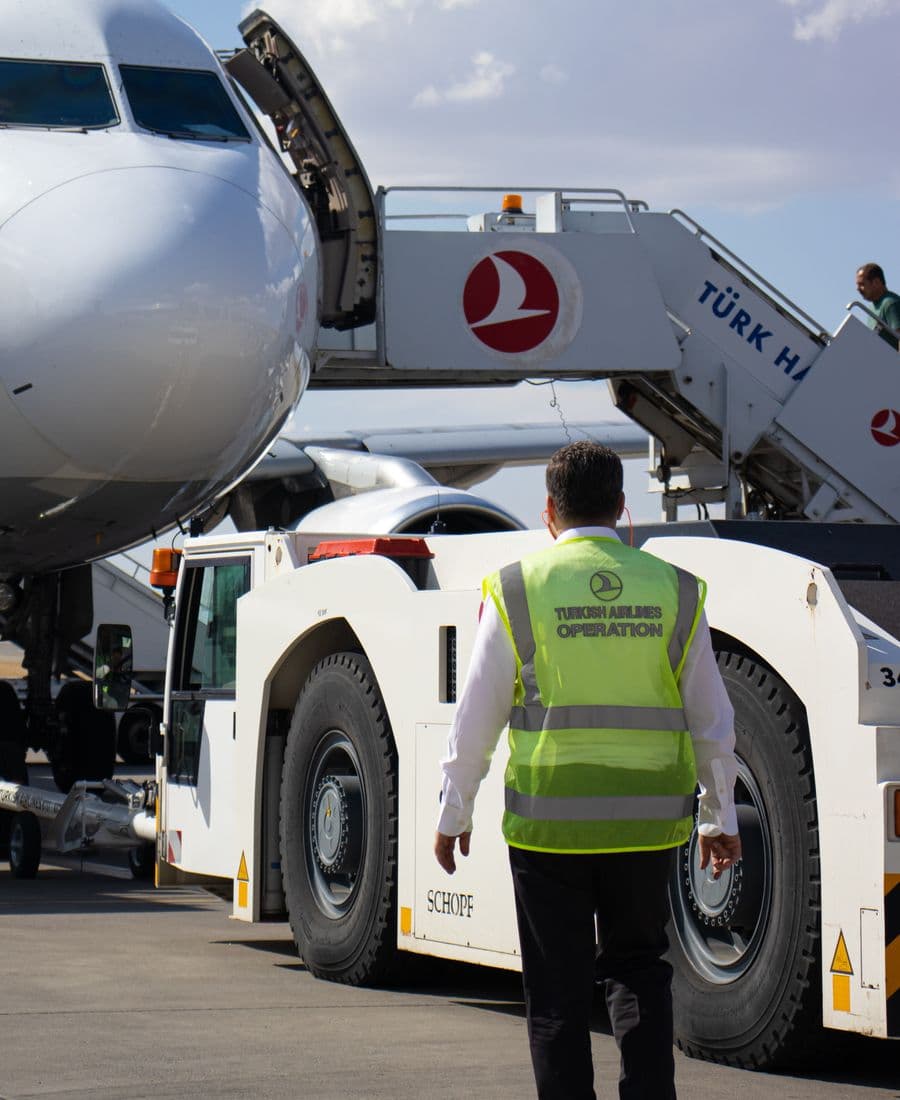 Airport ground crew servicing an aircraft